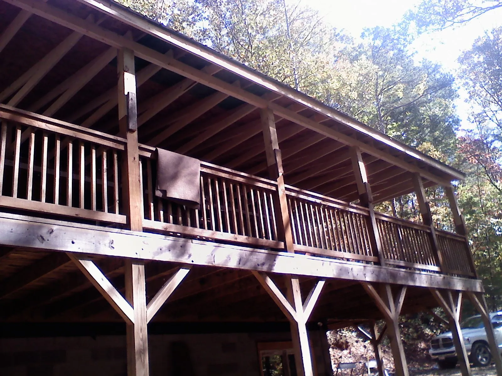 Timber framing under a new elevated porch and deck — Roof Leak Repair in Tie Siding by Roofing Brothers